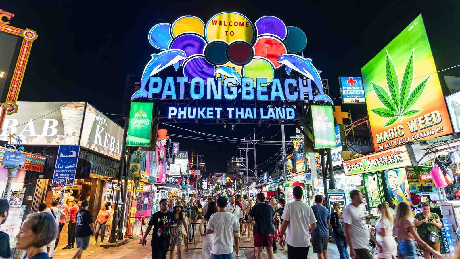Bangla Road at night with neon signs and crowds