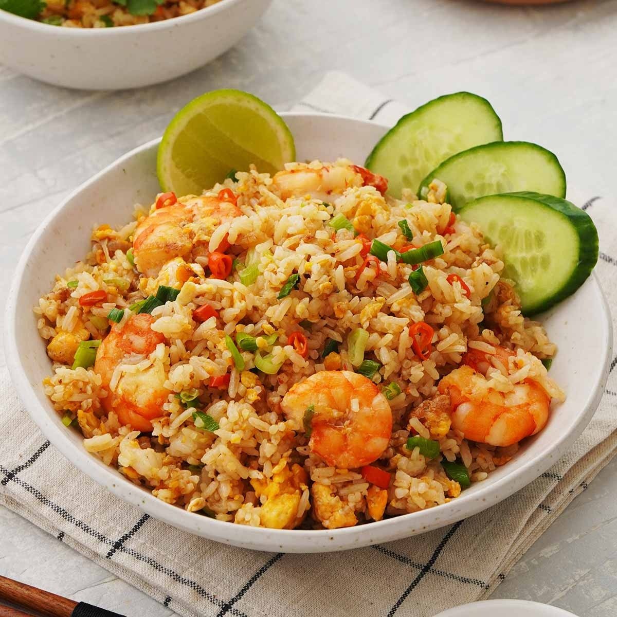 Khao pad: Thai fried rice with prawns, lime and cucumber