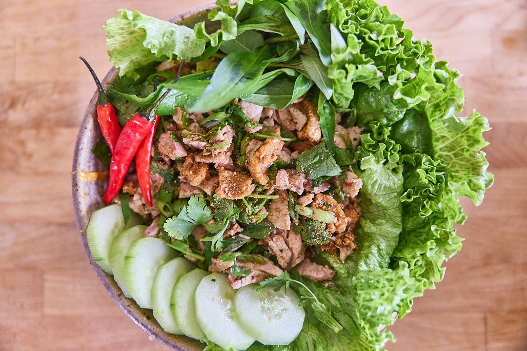 Laab: spicy minced meat salad with fresh herbs and cucumber